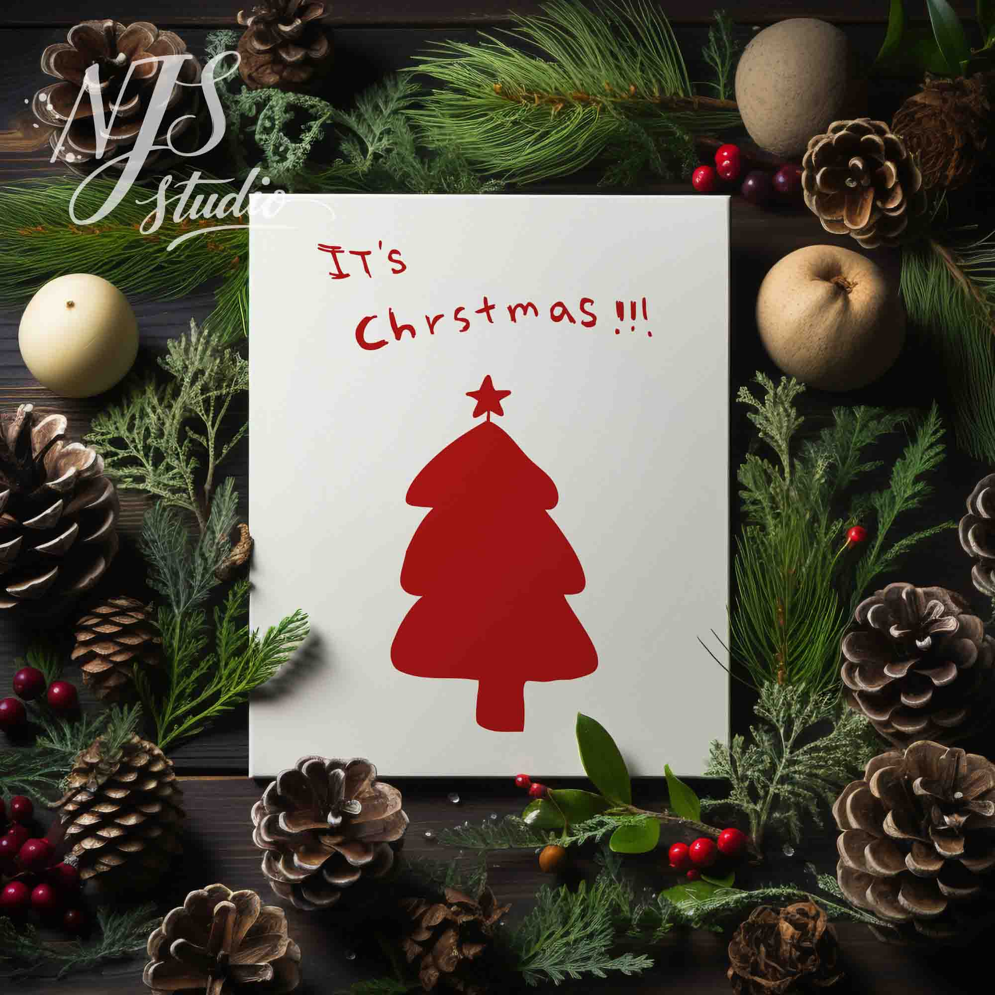 Holiday flatlay featuring pinecones and greenery surrounding a cute hand drawn red Christmas tree print.