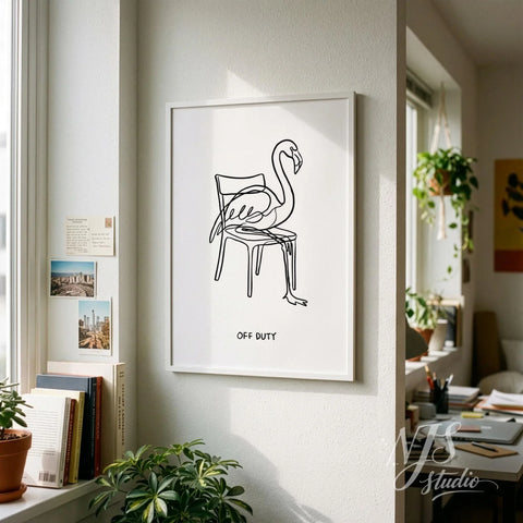 Minimal flamingo line art wall print with Off Duty text displayed in cozy Scandinavian style living room with plants and books