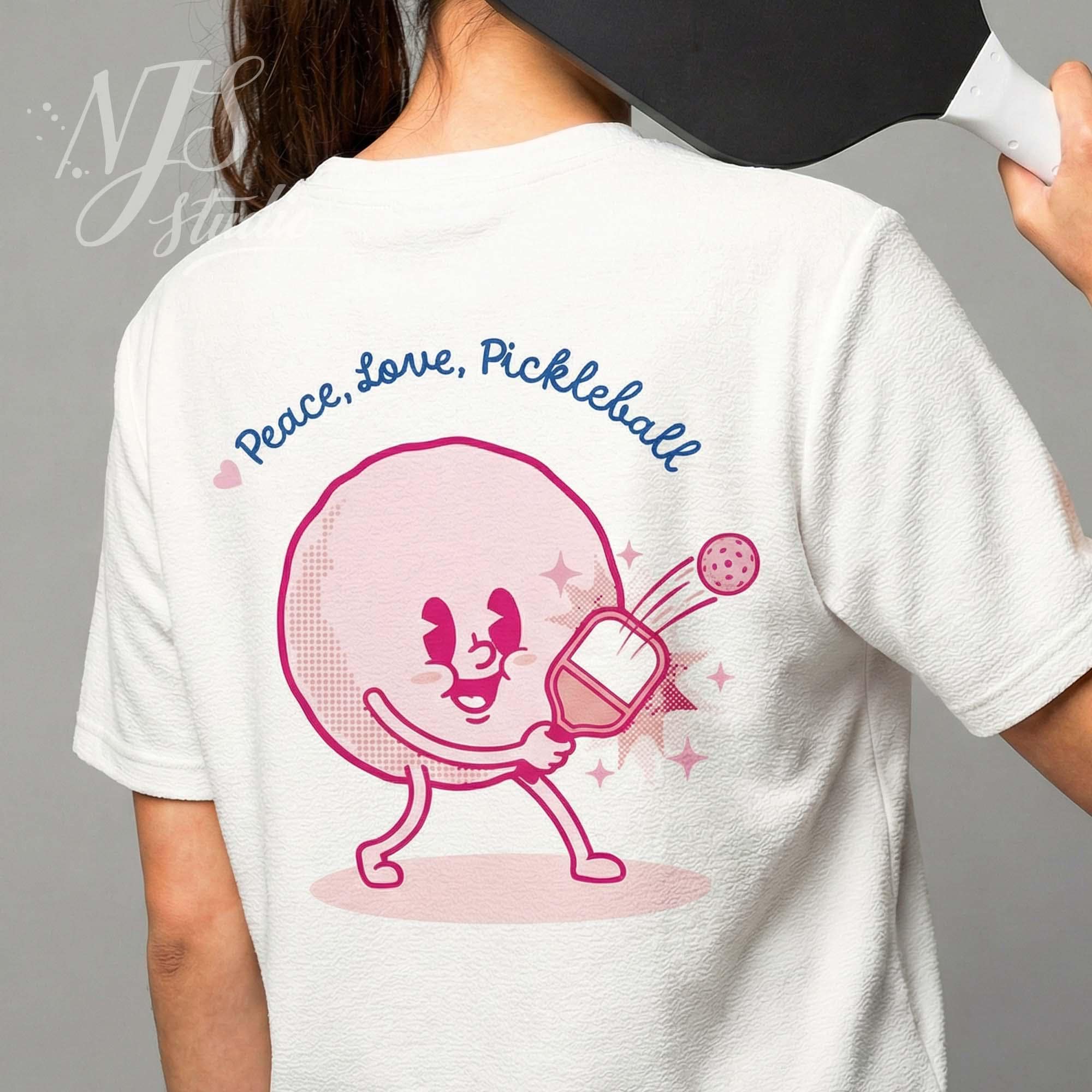 Back of white t-shirt featuring retro pink pickleball mascot. "Peace Love Pickleball" sublimation design for team apparel.