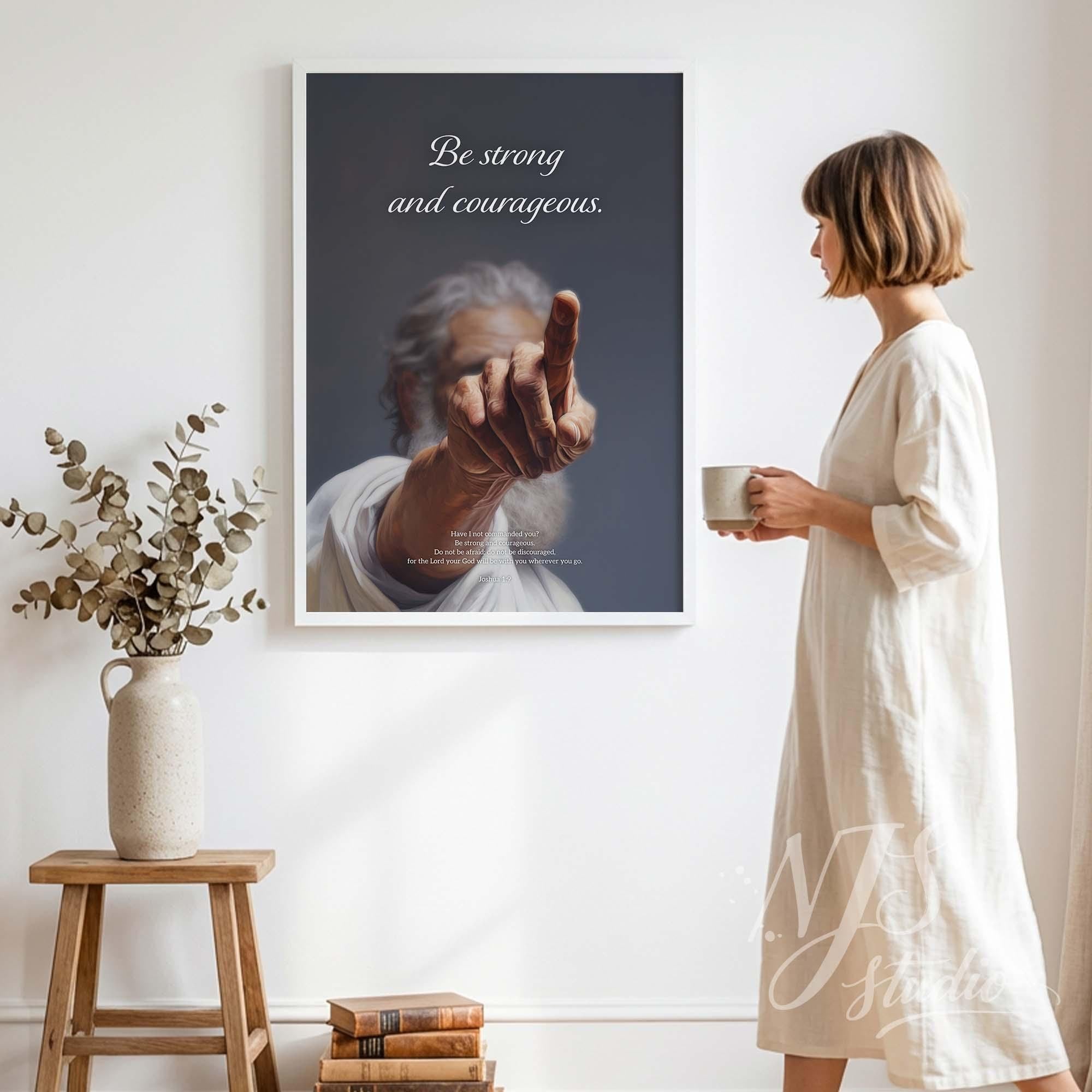 Large Christian wall art living room. Joshua 1:9 scripture print "Be strong and courageous" featuring powerful hand pointing.