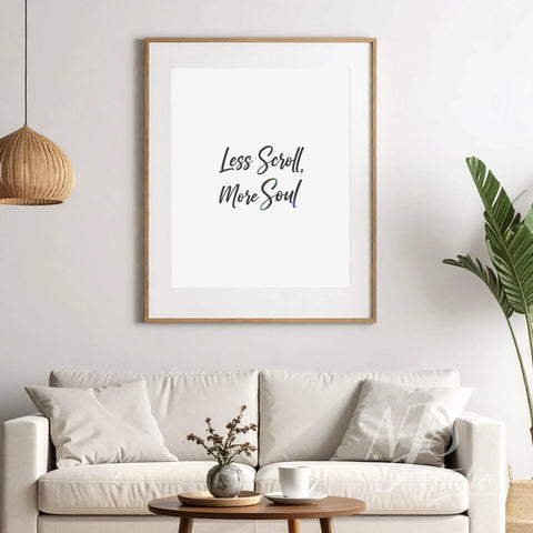 Large framed inspirational quote hanging above a sofa in a modern living room, lifestyle decor.