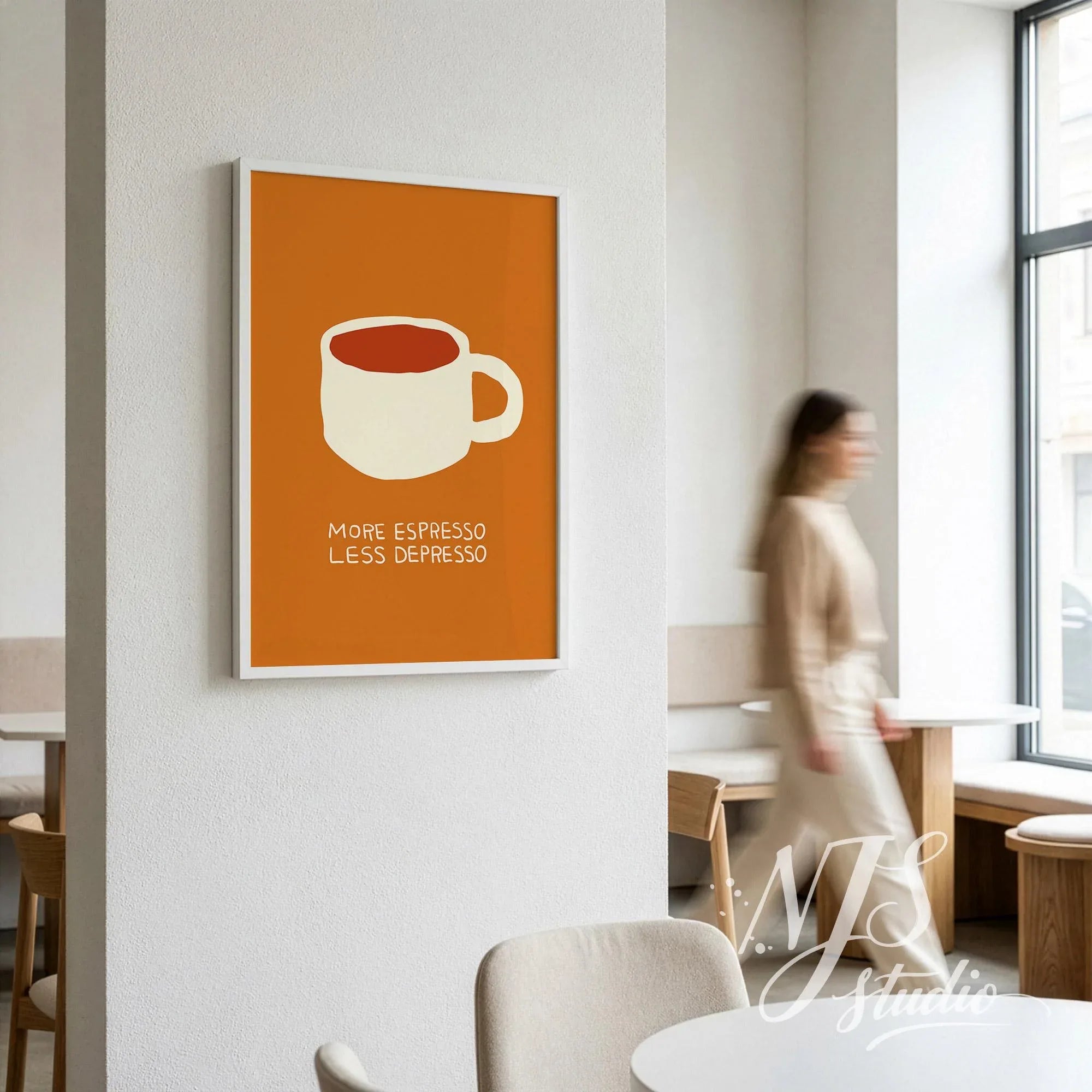 Orange minimalist wall art featuring a coffee mug illustration and More Espresso Less Depresso text in a cafe setting.