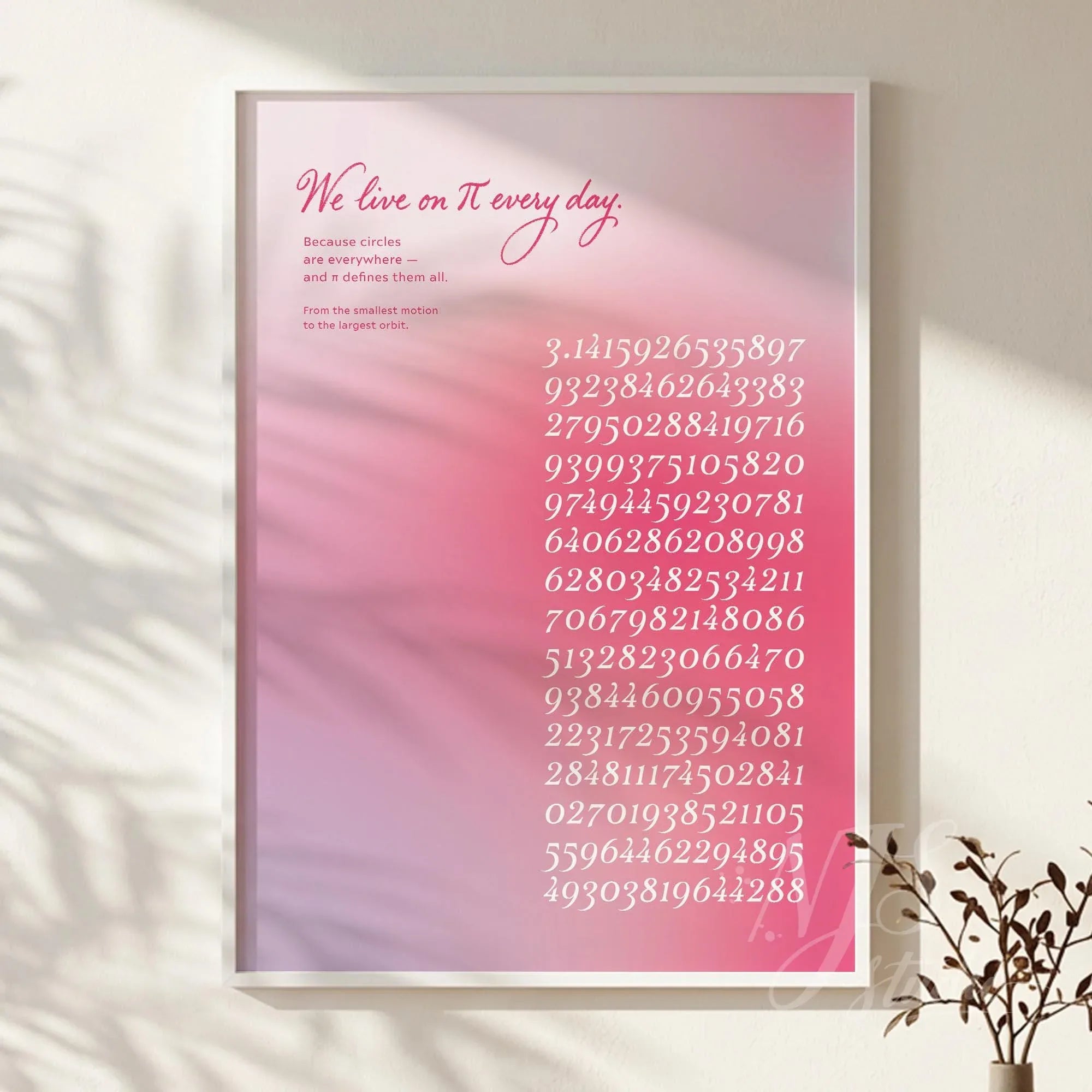 Framed pink gradient wall art featuring a mathematical pi quote and digits of pi displayed on a minimalist wall