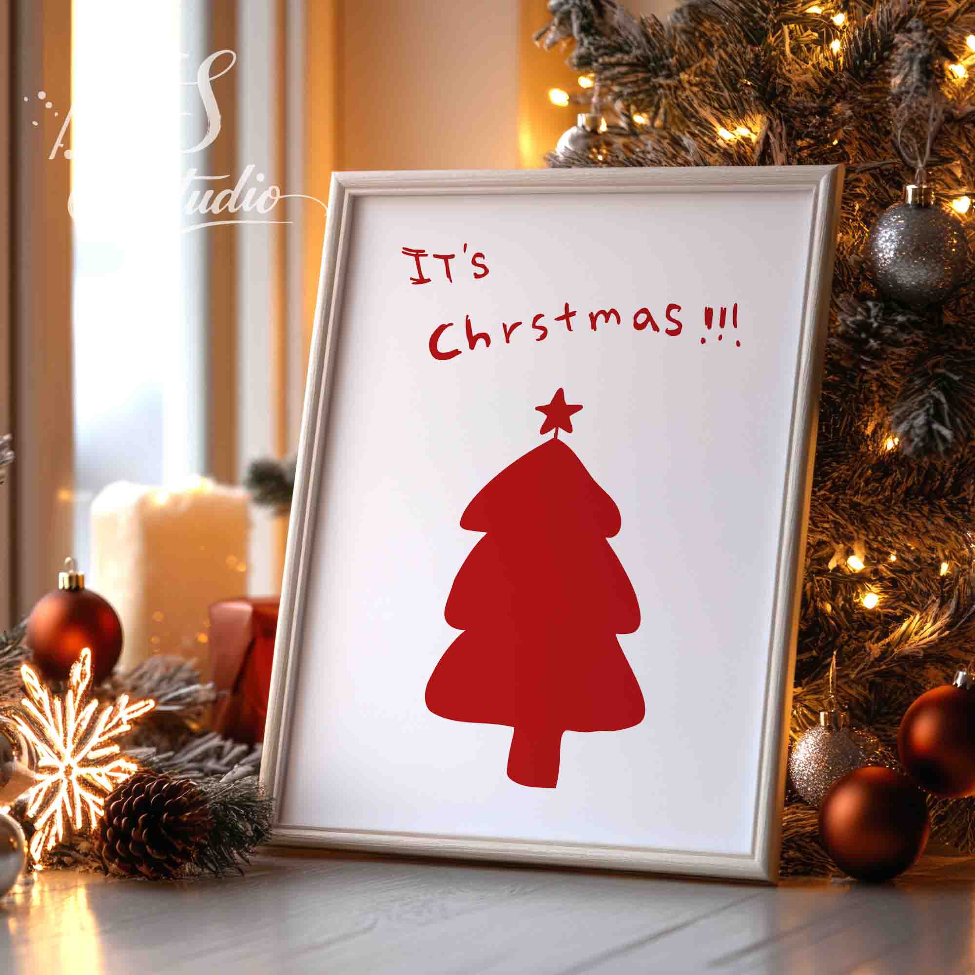 Minimalist red Christmas tree art poster framed on a mantle with warm holiday lights.