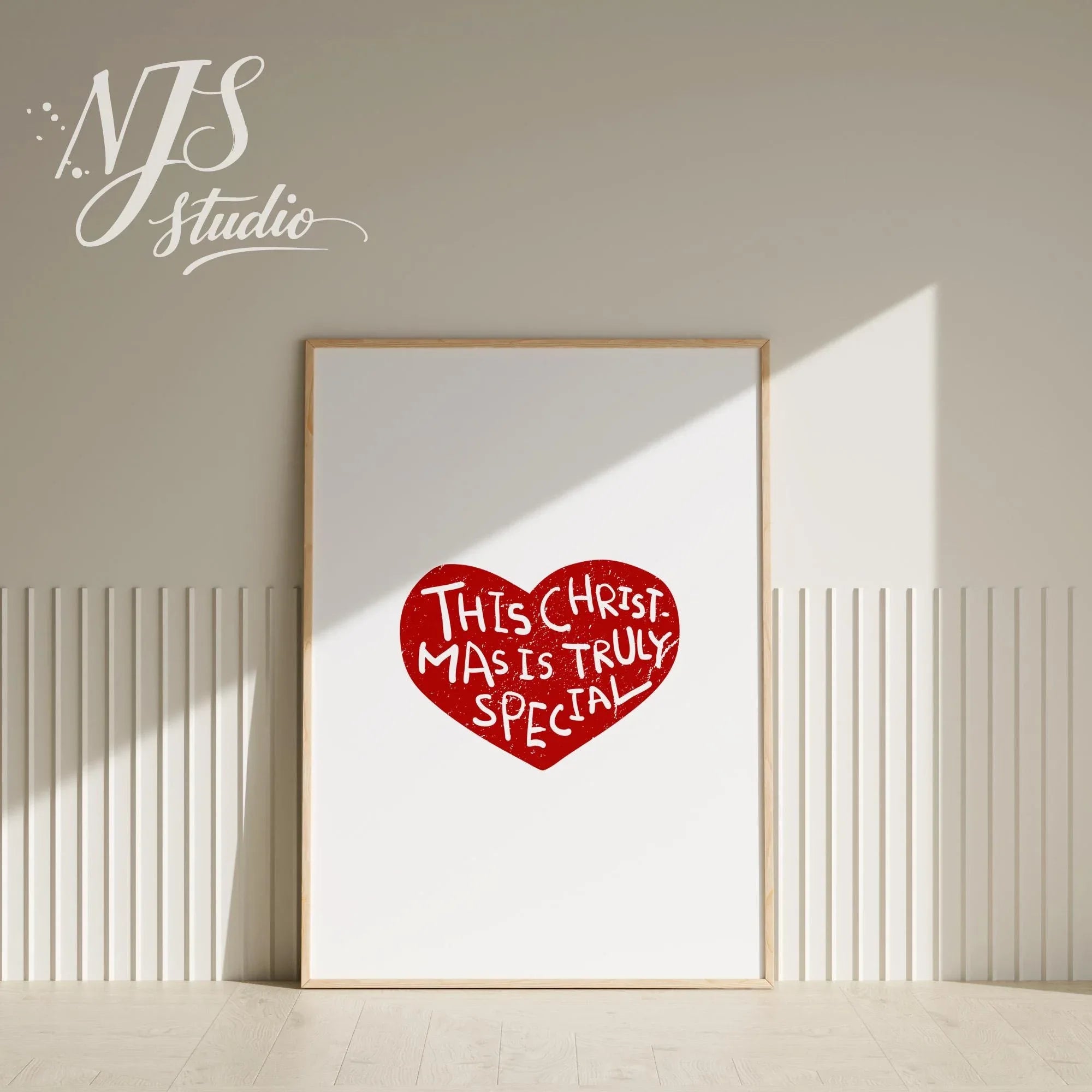 Minimalist holiday wall decor with red heart illustration and shadow overlay for trendy room aesthetic.